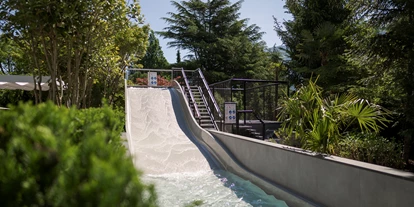 Wellnessurlaub - Babysitterservice - Breitwasserrutsche im Garten - Feldhof DolceVita Resort