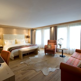 Wellnesshotel: Zimmer und Suiten im Alpen-Chic - Golfhotel Les Hauts de Gstaad & SPA
