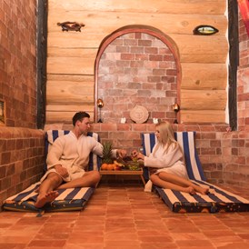 Wellnesshotel: Separee Relaxing Raum - MeerSpa Wellness. Wo Wellness tiefer wirkt. Kanadisches Blockhaus