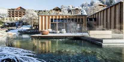 Wellnessurlaub - Dorf Tirol - Saunalandschaft am See - ADLER Spa Resort Balance