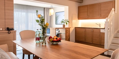 Wellnessurlaub - Umgebungsschwerpunkt: am Land - Gramatneusiedl - Bungalow B2 - Küche- und Essbereich - VILA VITA Pannonia