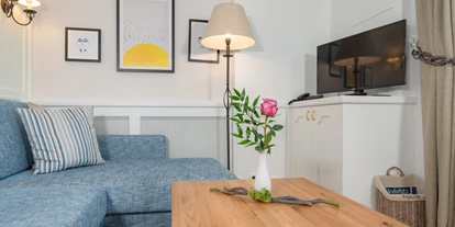 Wellnessurlaub - Umgebungsschwerpunkt: am Land - Gramatneusiedl - Bungalow A1 - Wohnzimmer - VILA VITA Pannonia