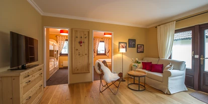 Wellnessurlaub - Umgebungsschwerpunkt: am Land - Gramatneusiedl - Bungalow A2 - Wohnbereich - VILA VITA Pannonia