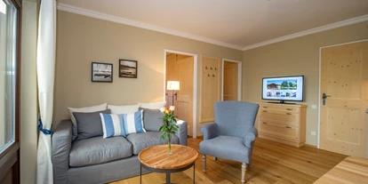 Wellnessurlaub - Umgebungsschwerpunkt: am Land - Gramatneusiedl - Bungalow A2 - Wohnbereich  - VILA VITA Pannonia