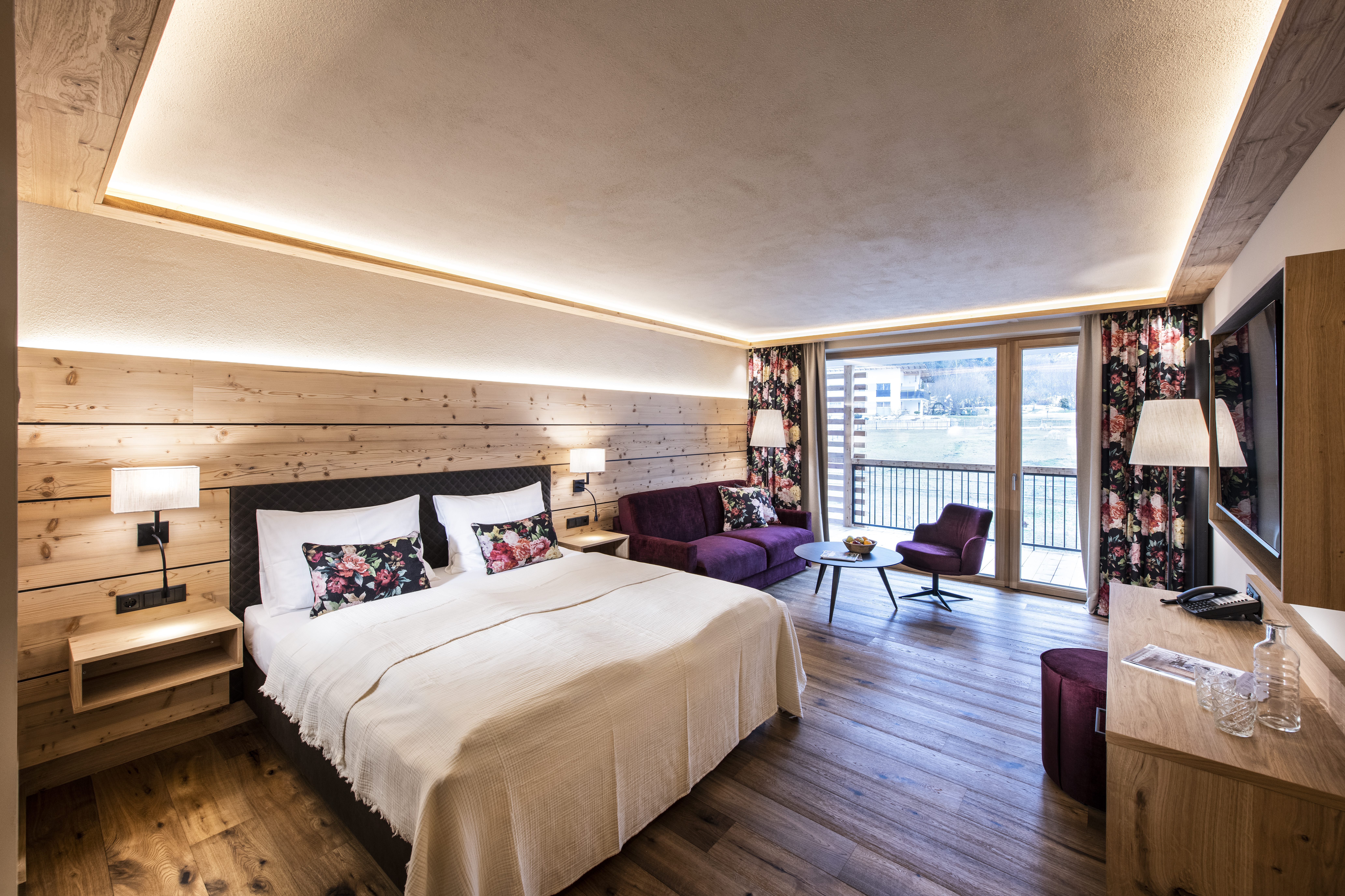 Wellnesshotel: Juniorsuiten mit natürlichen Materialien gestaltet - Natur Resort Rissbacher