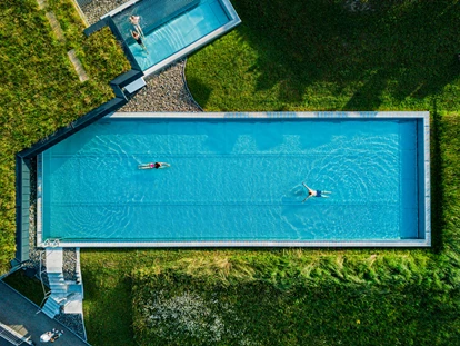 Wellnessurlaub - Fontanella - Sportpool ganzjährig beheizt mit 25x8m Fläche. - Haubers Naturresort