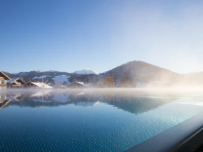 Wellnessurlaub - Fontanella - Herrliche Stimmung in der Wintersonne...morgens am Pool. - Haubers Naturresort