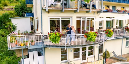 Wellnessurlaub - Hotelbar - Ubstadt-Weiher - Außenansicht auf die Zimmer des Wellnesshotel Rothfuss - Wellnesshotel Rothfuss