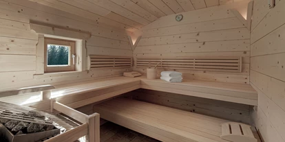Wellnessurlaub - Private Spa - Otterbach (Sankt Florian am Inn) - INNs HOLZ Chalet Sauna des Private Spas im Chalet - INNs HOLZ Chaletdorf